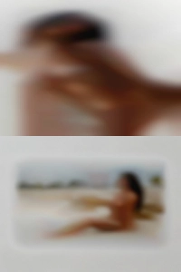 Enjoys another's nude woman kissing company.
